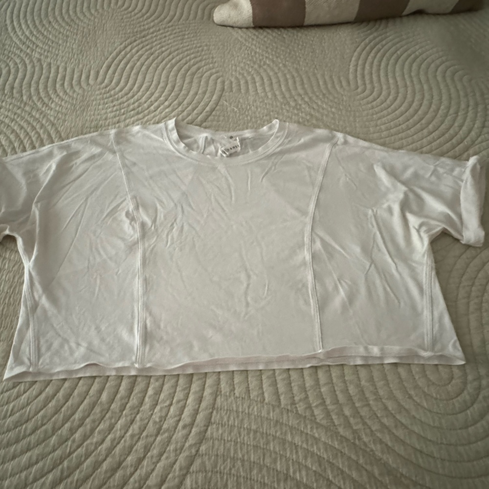 Lululemon crop top and Kora low open back long sleeve.